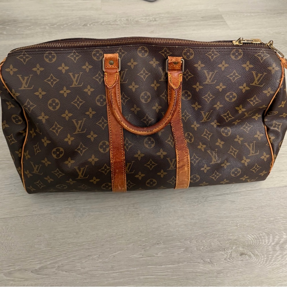 Preloved vintage LV BANDO KEEPALL 45. Needs repair. No strap